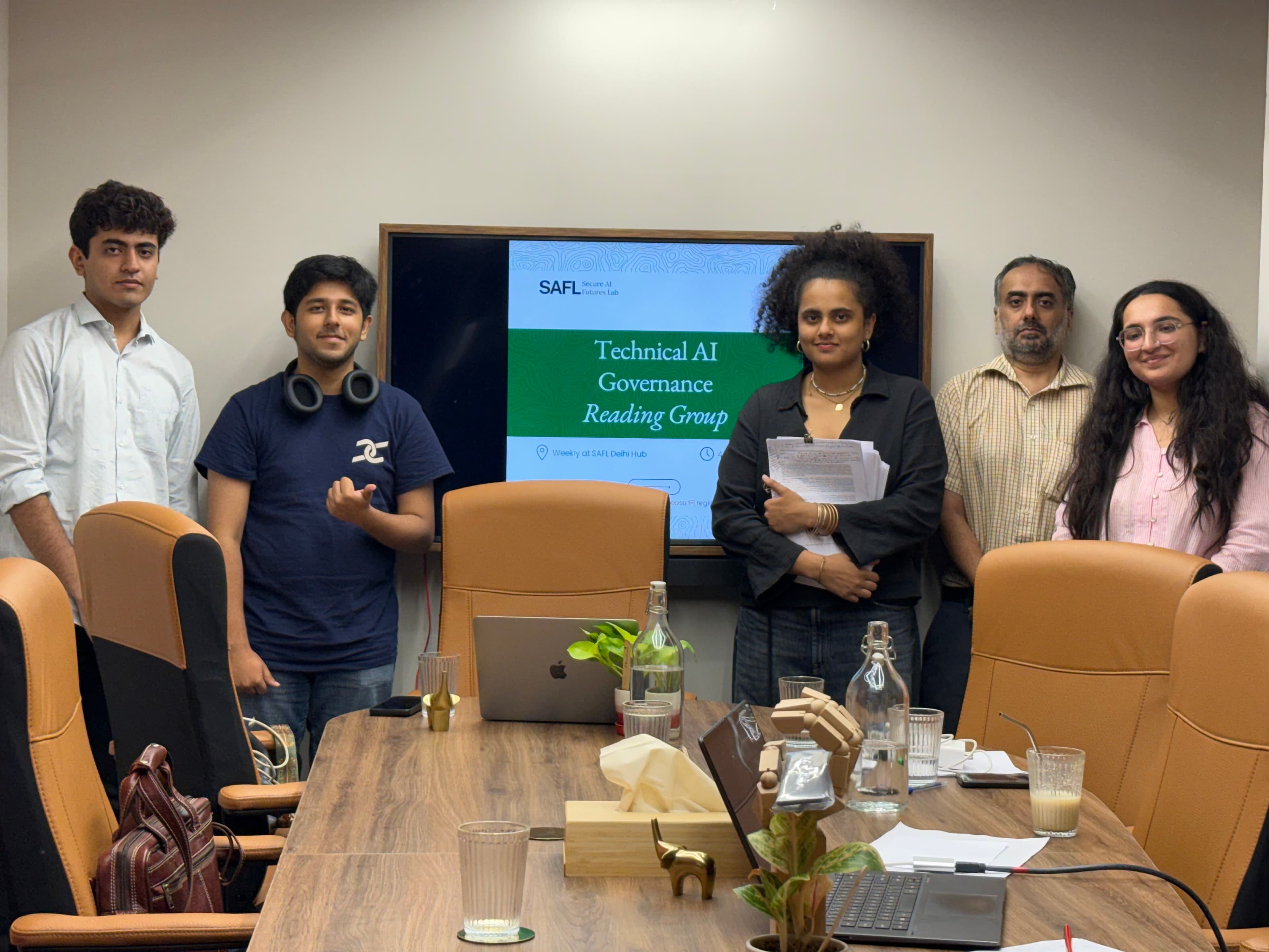 Participants discussing a paper at the SAFL Delhi hub in Saket